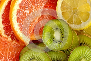 Fresh kiwi, lemon and grapefruit background