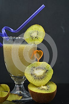 Fresh kiwi shake fruit drink in glass photo