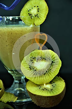Fresh kiwi shake fruit drink in glass photo