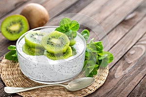 Fresh kiwi yogurt with fruits and chia seeds