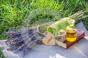Fresh lavender, essential oil and healthy herbs. Spa concept. Natural cosmetics.