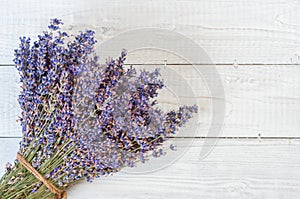 Fresh lavender flowers on white wood table background