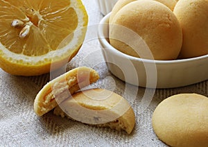 Fresh lemon and assorted white lemon cookies whole and sliced