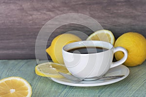 Fresh lemon black coffee in white cup