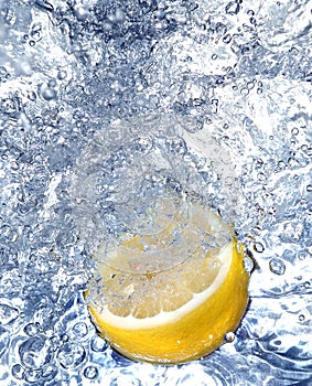 Fresh lemon in cold water