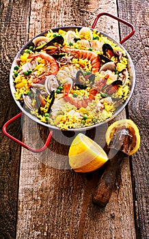 Fresh Lemon and Colorful Seafood Paella Rice Dish