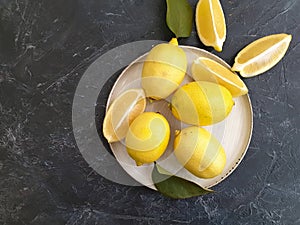 Fresh lemon refreshing  organica plate concrete background photo