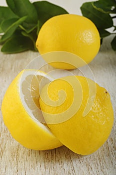 Fresh lemon on wooden background