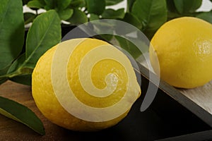 Fresh lemon on wooden background