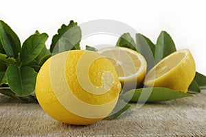 Fresh lemon on wooden background