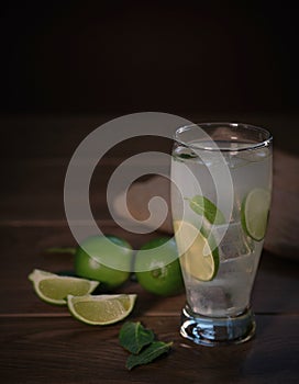 Fresh lemonade or lemon juice squeezing lemons wood photo