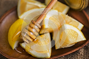 fresh lemons and freshly picked flower honey