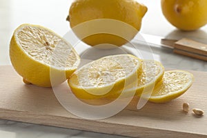 Fresh lemons and slices