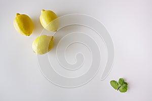 Fresh lemons on white background