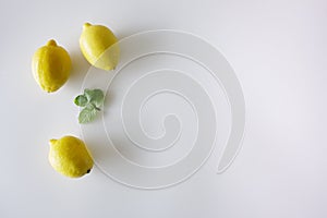 Fresh lemons on white background