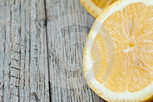 Fresh lemons on a wooden back ground with copy space