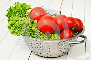 Fresh lettuce and two kinds of tomatoes