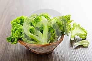 Fresh lettuce vegetable on a wooden table