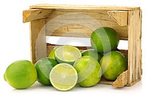 Fresh lime fruit in a wooden crate