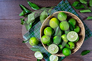 Fresh lime in green basket