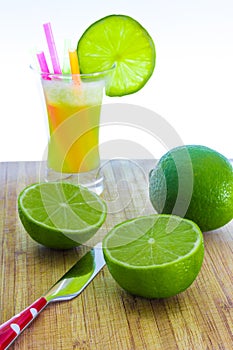 Fresh lime juice on wooden table