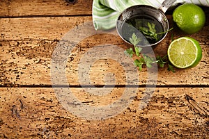 Fresh lime and parsley with a frying pan