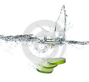 Fresh lime with water splash isolated