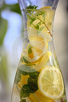 Fresh lemonade in bottle photo