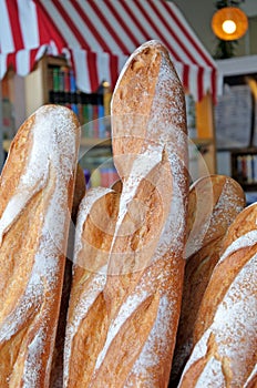 Fresh loafs of French bread outside a bakery in Paris France photo