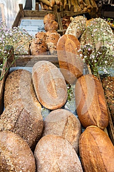 Fresh loaves of bread on display at farmers market