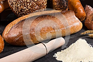 Fresh loaves of bread with flour wheat and gluten