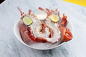 Fresh lobster with sauce and lime