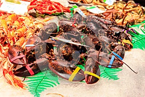 Fresh lobsters at seafood market