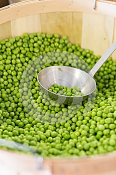 Fresh loose peas in a basket