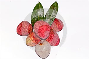 Fresh lychee fruit.Peeled and unpeeled Lychee fruit on white background with green leaves