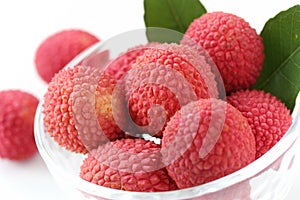 Fresh lychees in glass bowl