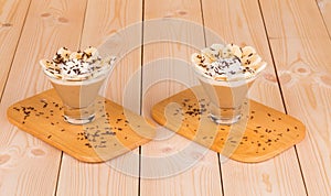 Fresh made Banana Milkshake on wooden background