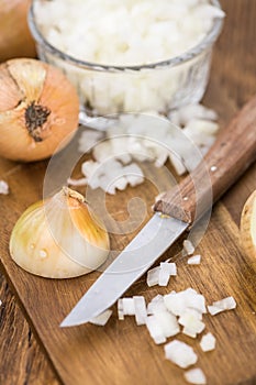 Fresh made Chopped white onions on a rustic background