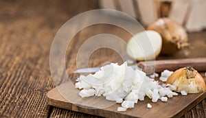 Fresh made Chopped white onions on a rustic background