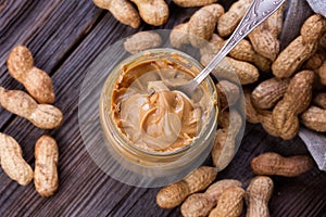 Fresh made creamy Peanut Butter in a glass jar