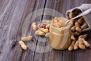 Fresh made creamy Peanut Butter in a glass jar