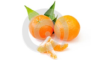 Fresh mandarin with leaf isolated on white