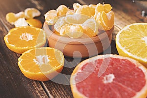 Fresh mandarin orange on wooden background