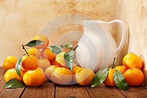 Fresh mandarin oranges fruit or tangerines with leaves