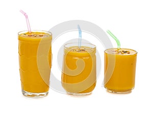 Fresh mango fruit juice on white background