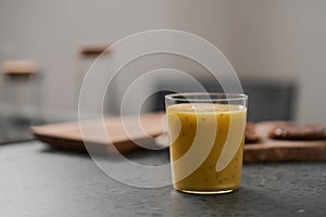Fresh mango lulo smoothie on kitchen countertop