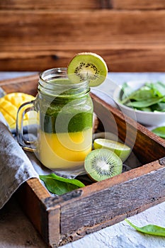 Fresh mango, spinach, kiwi and lime smoothie