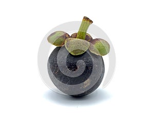 Fresh mangosteen with dark purple spheres and antioxidants, which help to slow down aging and wrinkles.