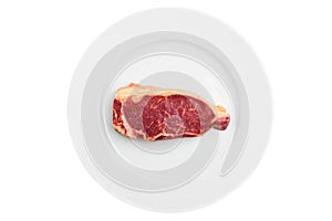 Fresh marbled meat on a plate