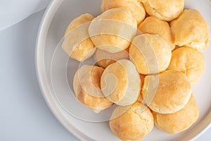 Fresh milk eclair in white plate